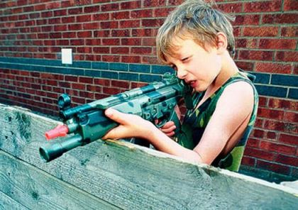 Boy With Toy Gun